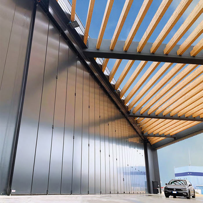 Portalp porte industrielle pliante grande dimension Moreschi grise fermée