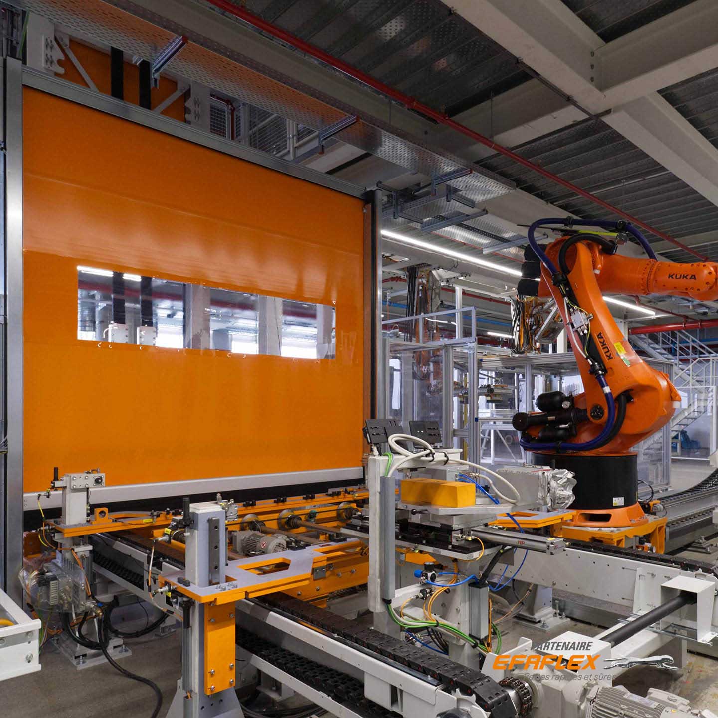 porte industrielle souple rapide enroulable orange, protection machine industrielle en situation
