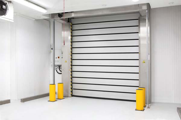 Porte à enroulement isolante pour chambre froide